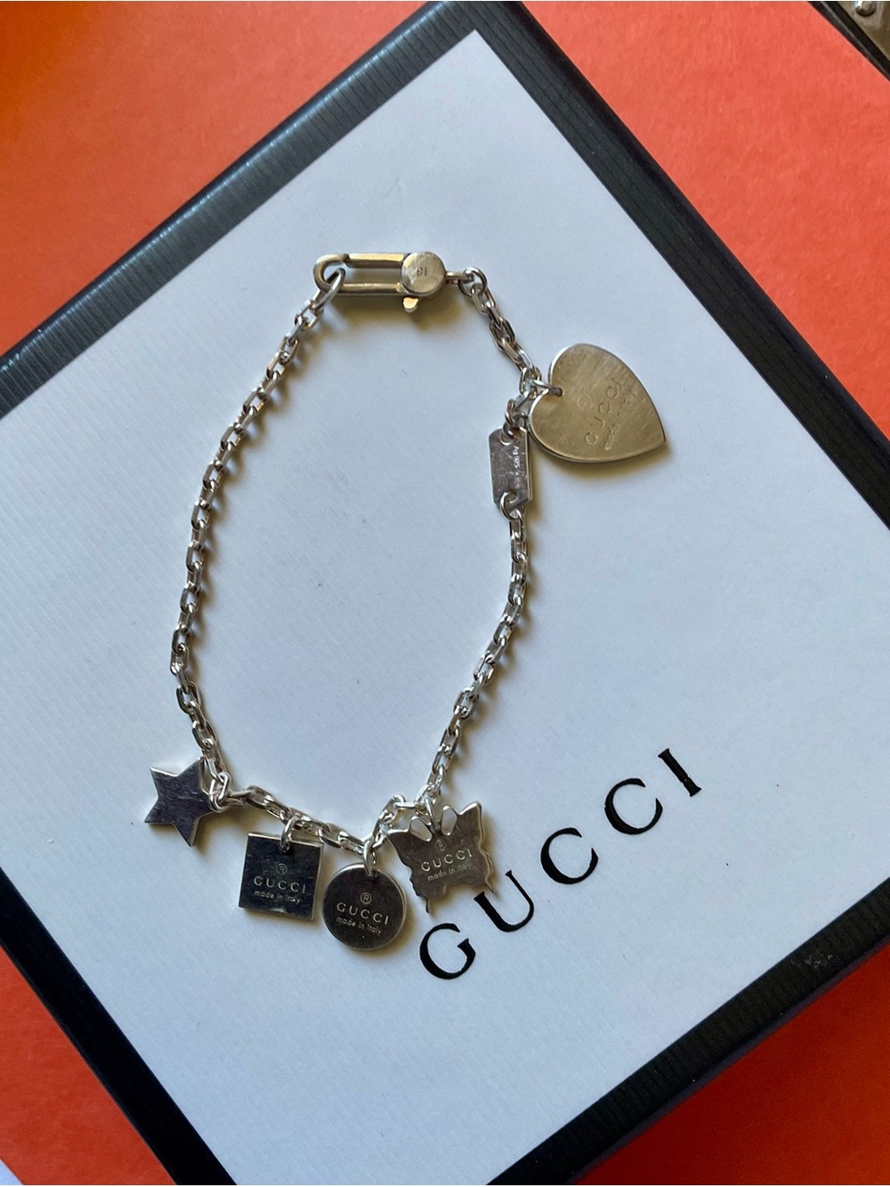 Gucci Silver Charm Bracelet with Heart, Star, butterfly & Logo Tags